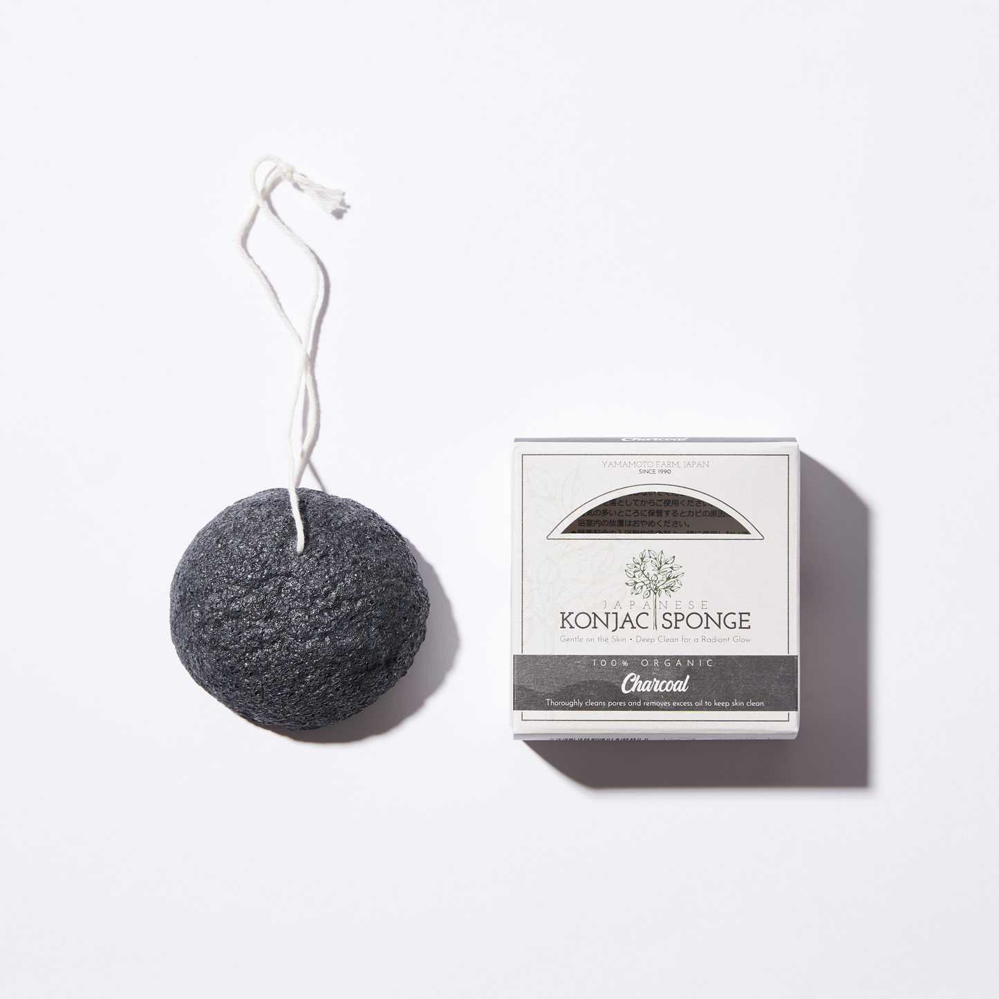 Eponge nettoyante konjac au charbon actif purifiant visage et corps